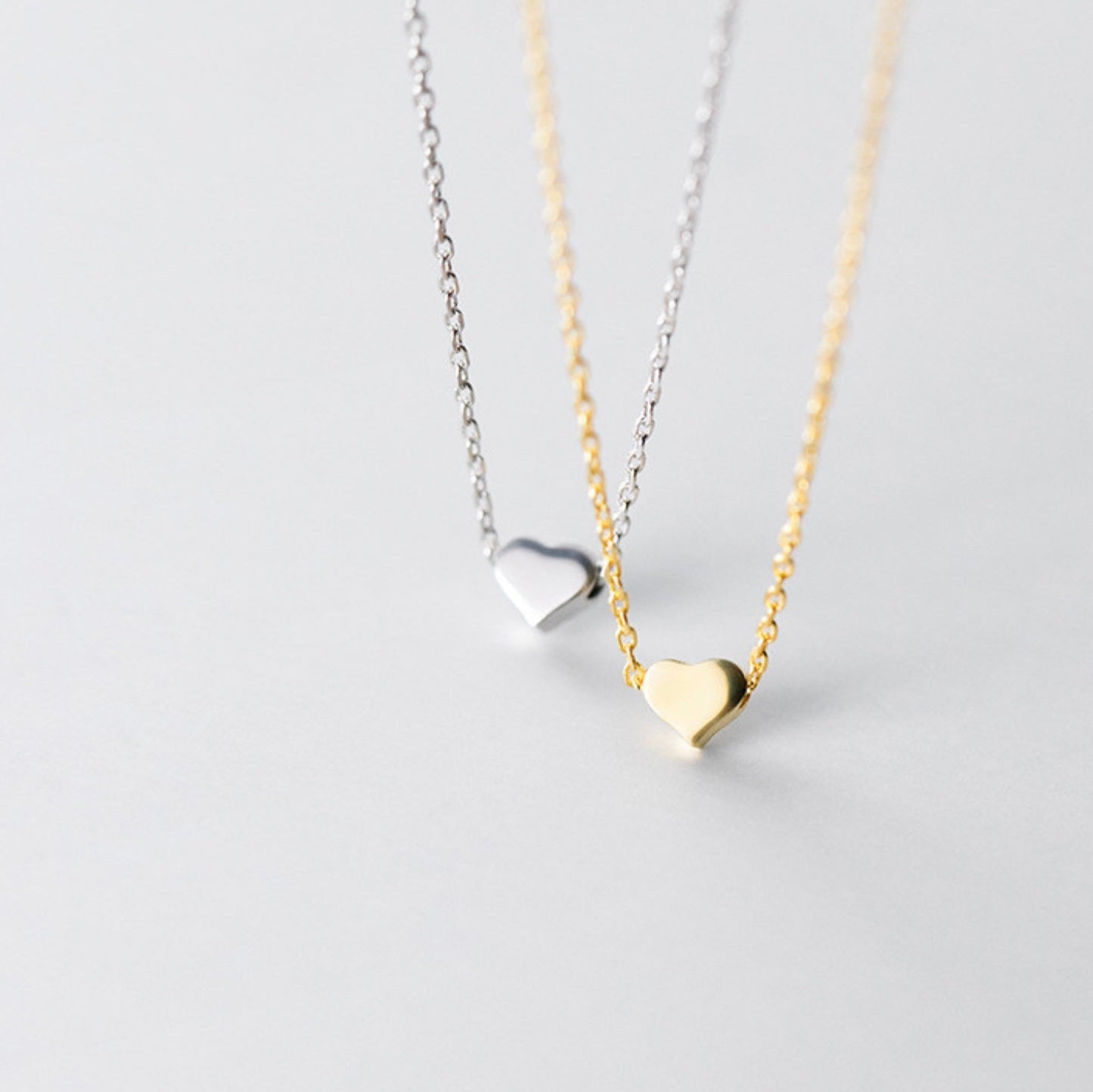 Necklace with Heart charm.