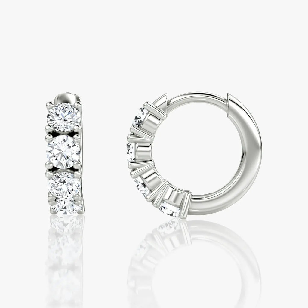Diamond hoop earrings on a white background