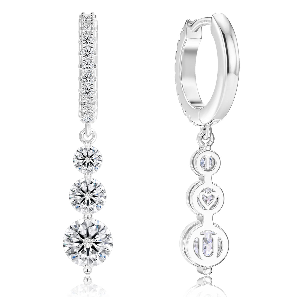 A pair of silver huggie hoop earrings with dangling triple-stone round-cut diamond charms, shown on a clean white background with one earring facing forward and the other showing the side profile.
