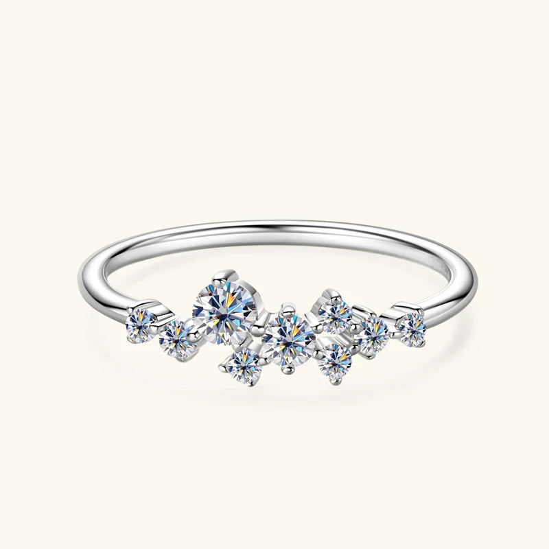 Silver ring with diamond-like crystals on a white background