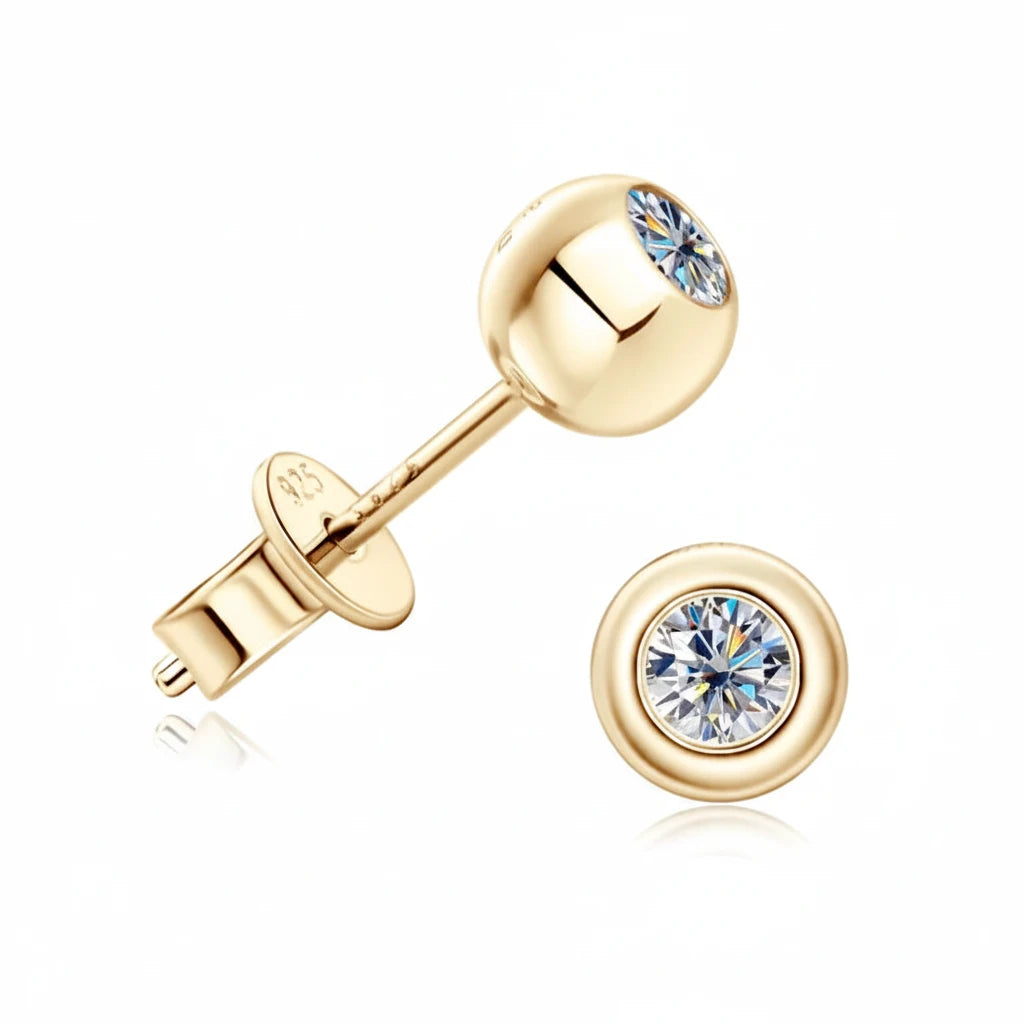 Gold earrings with clear gemstones on a white background, featuring the Chasau brand.
