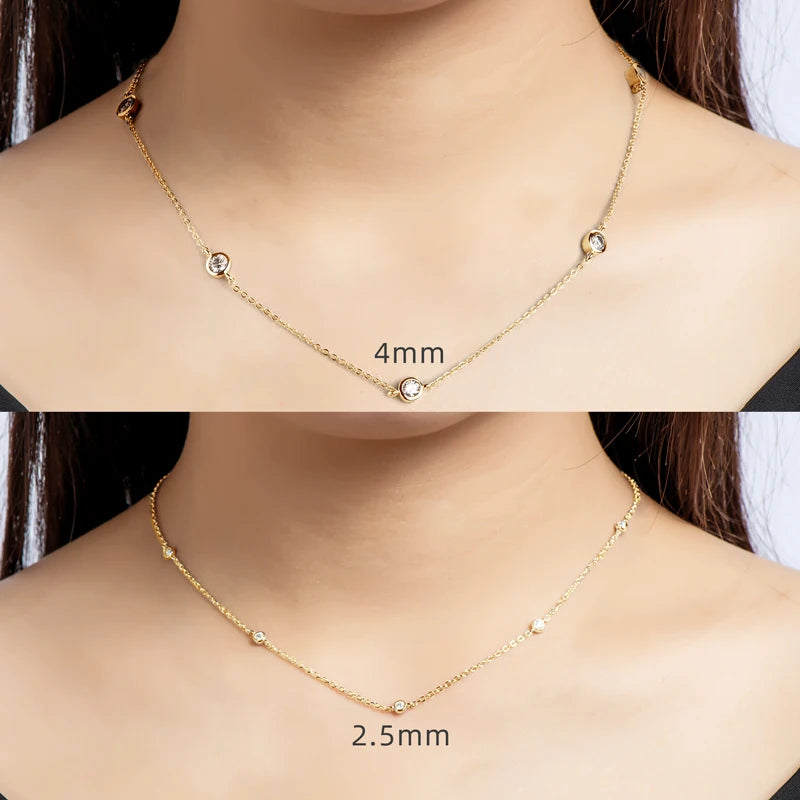 Gold necklace with two different width options displayed on a person's neck.
