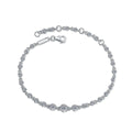 Silver bracelet with diamond accents on a white background