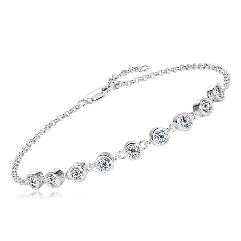 Silver bracelet with clear gemstones on a white background