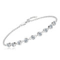 Silver bracelet with clear gemstones on a white background