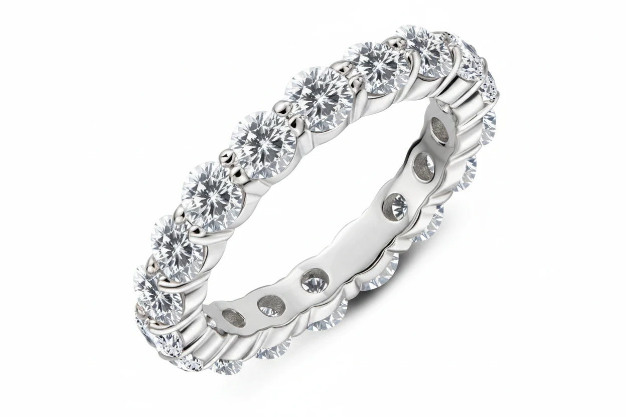 A silver-toned eternity ring with a continuous row of round clear gemstones, shown on a white background with the CHASAU brand logo in the top left corner.