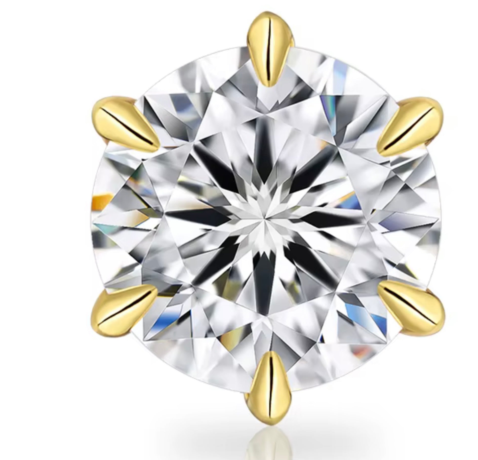 A round brilliant-cut diamond solitaire engagement ring set in yellow gold prongs against a white background.