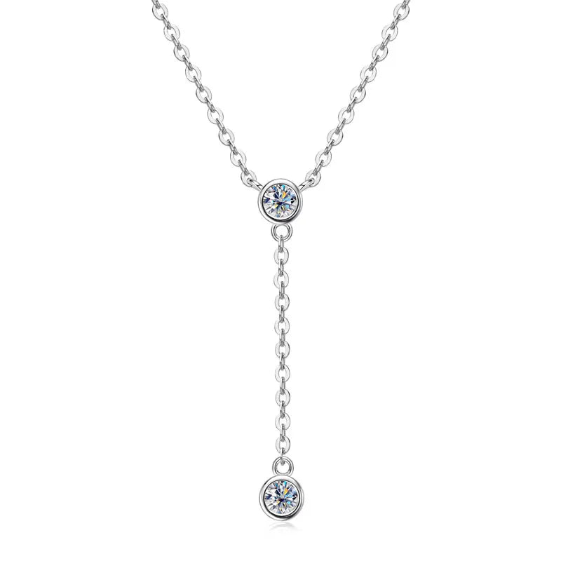 Silver necklace with two round Moissanite on a white background